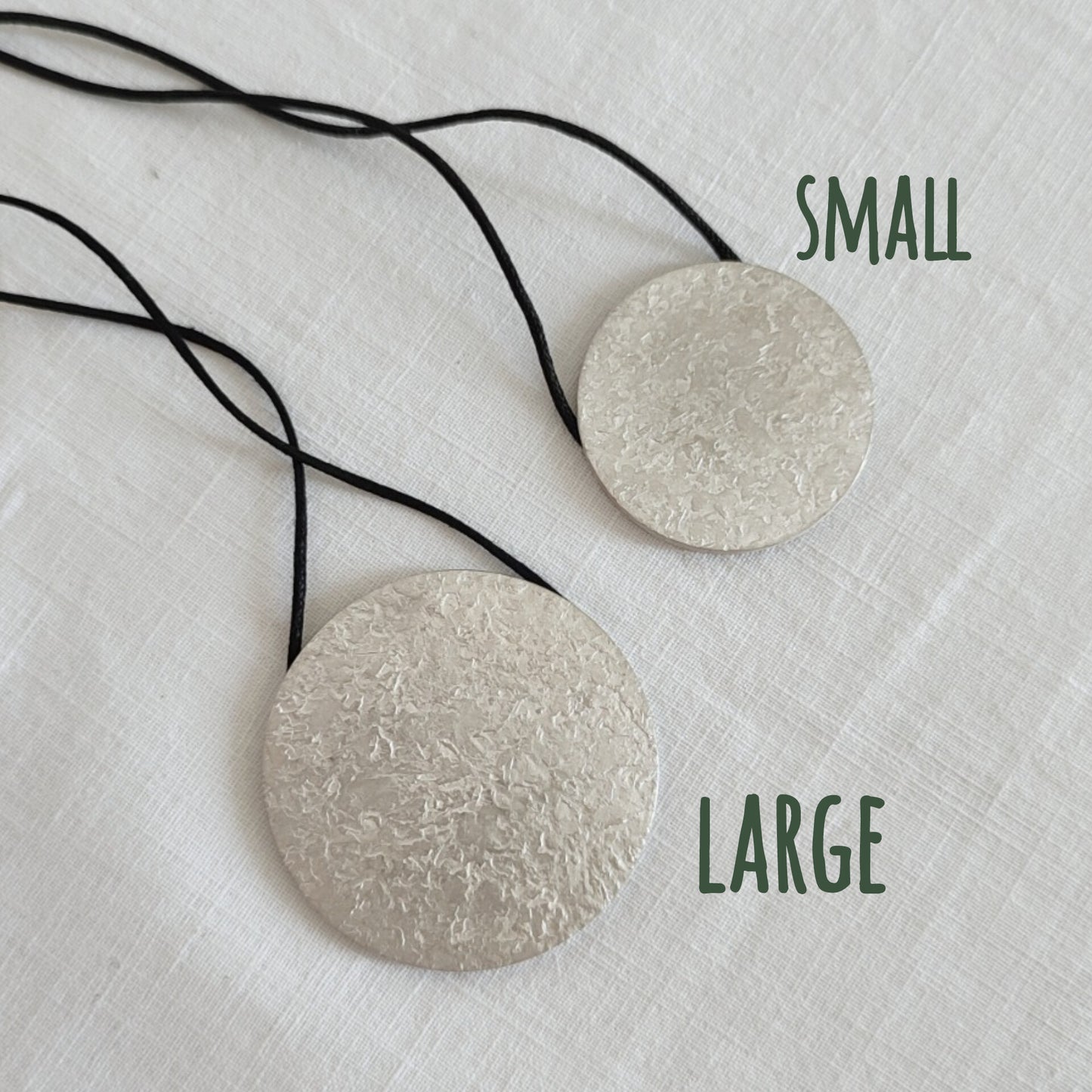 MOVE - Double Face Round Pendant