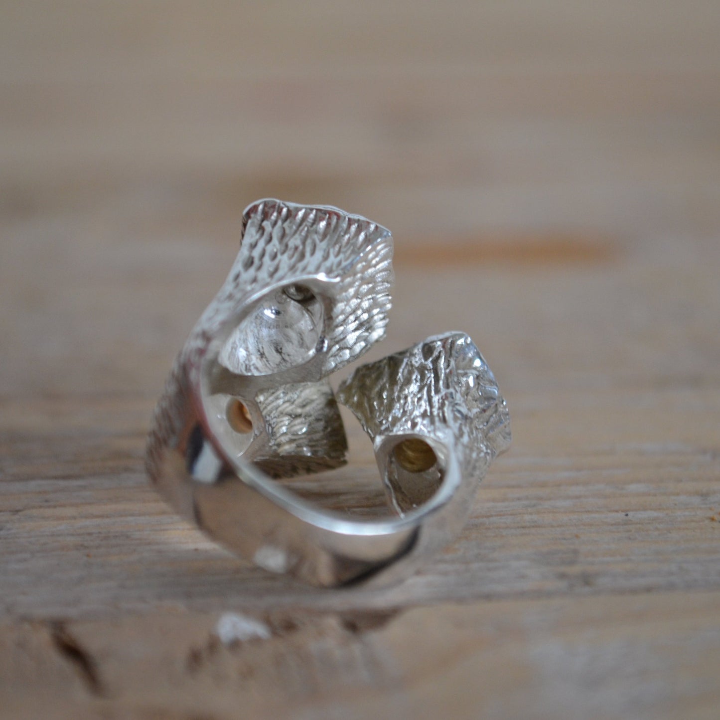 Recycled silver ring with orange-yellow sapphires