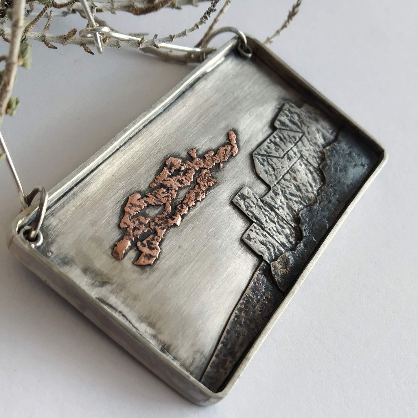 Silver and copper pendant representing a Italian village. Handmade chain and clasp.