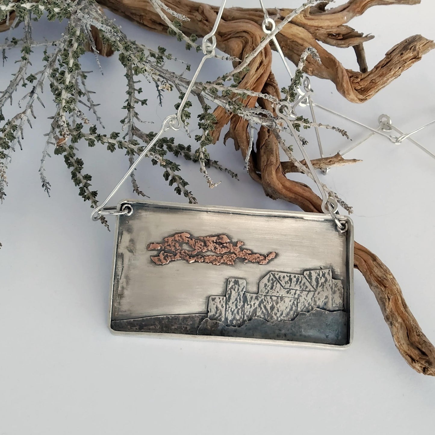 Silver and copper pendant representing a Italian village. Handmade chain and clasp.