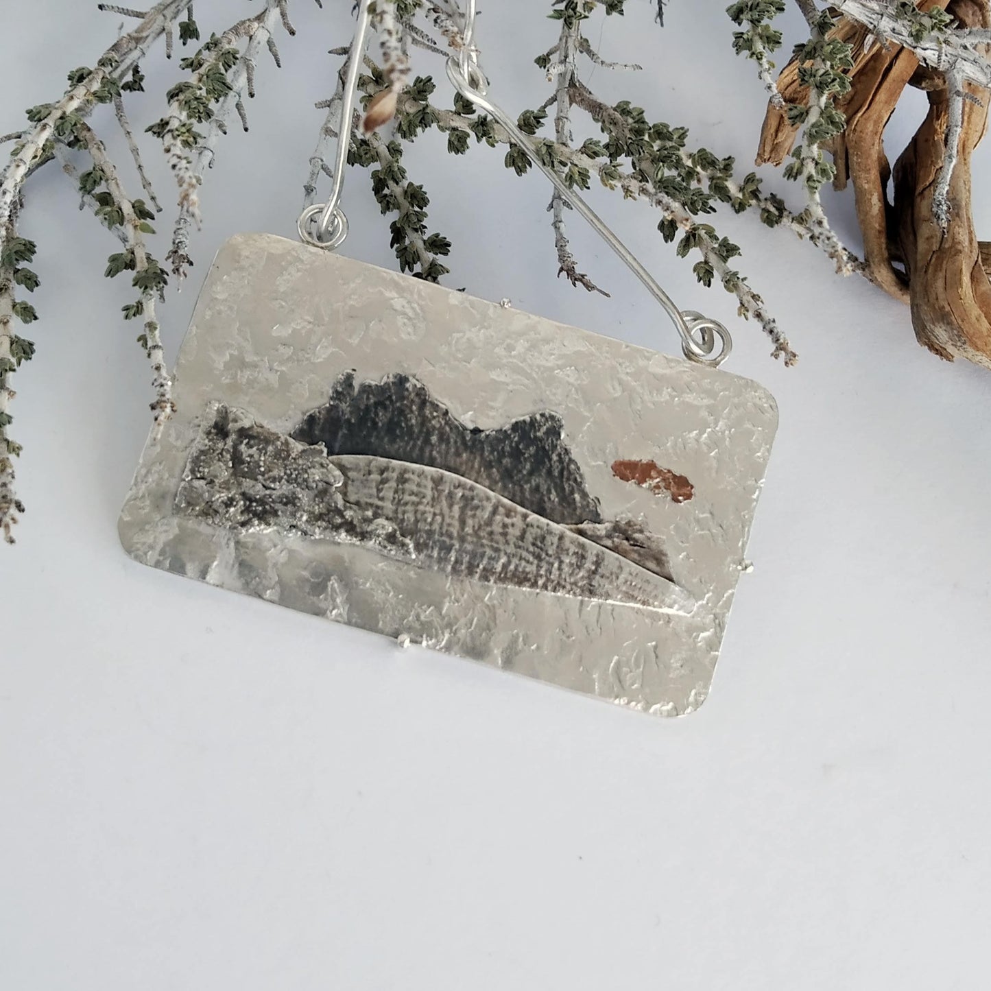Silver and copper pendant with handmade chain representing a mountain