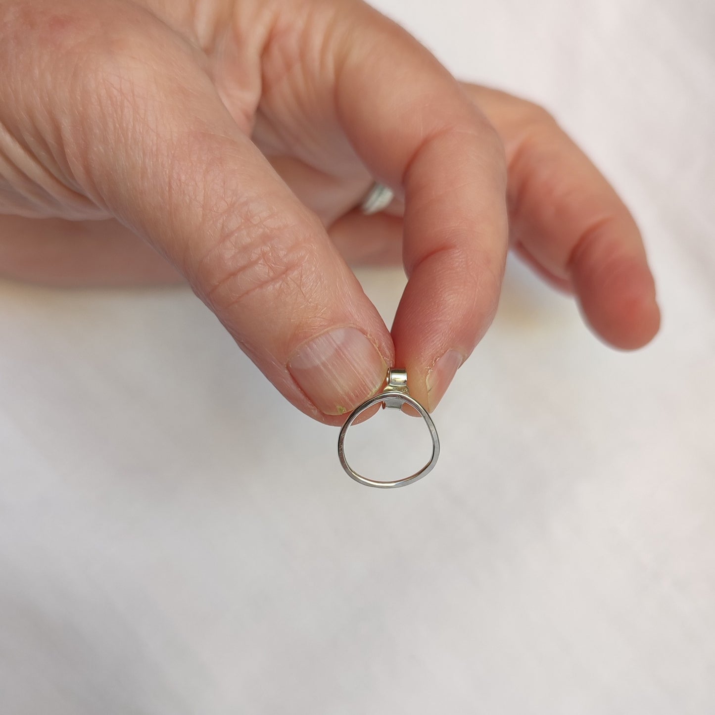 Small asymmetric earrings
