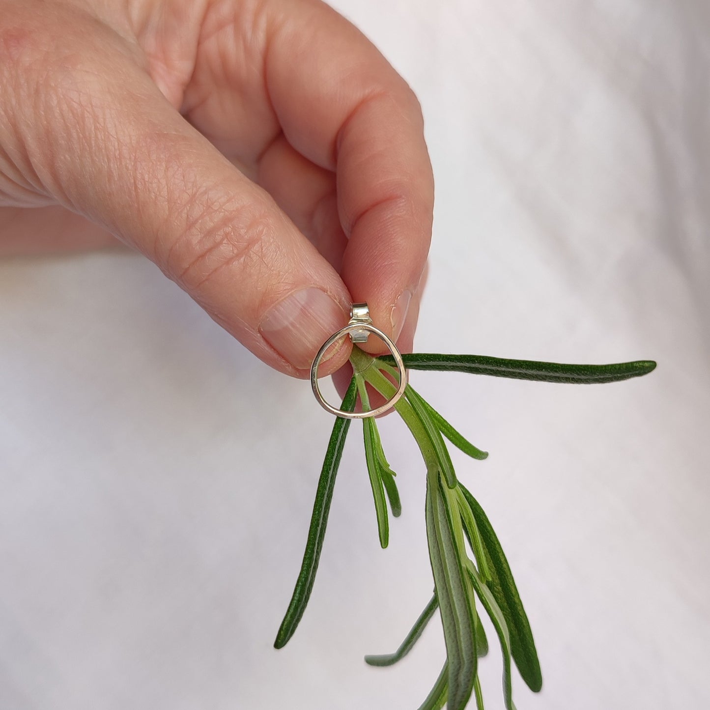 Small asymmetric earrings