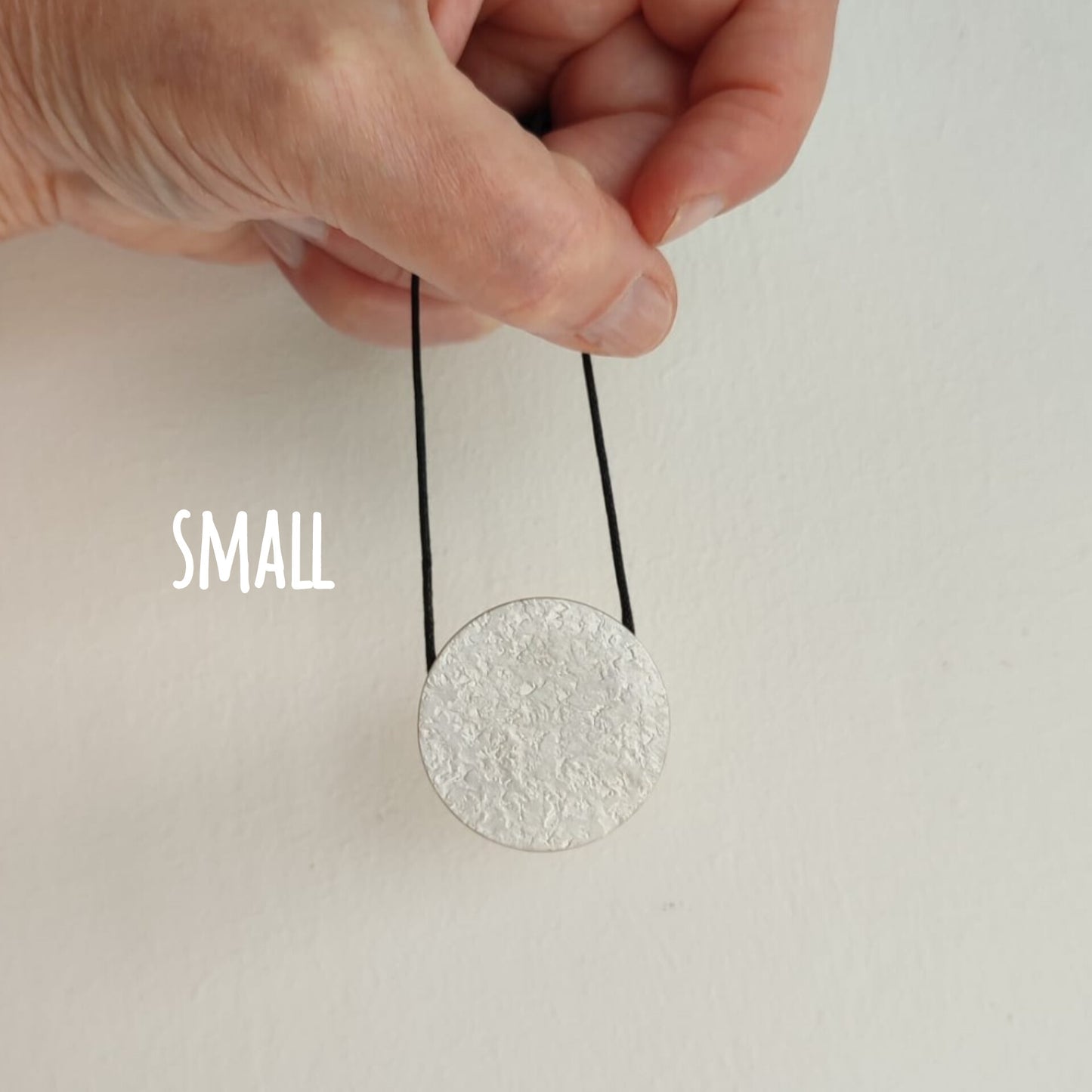 MOVE - Double Face Round Pendant