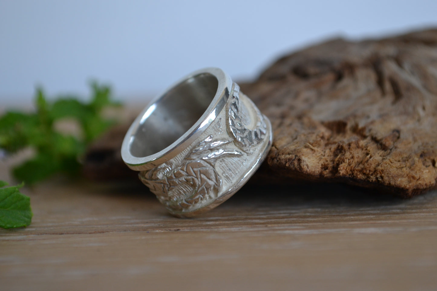 Silver ring with dragon. Band