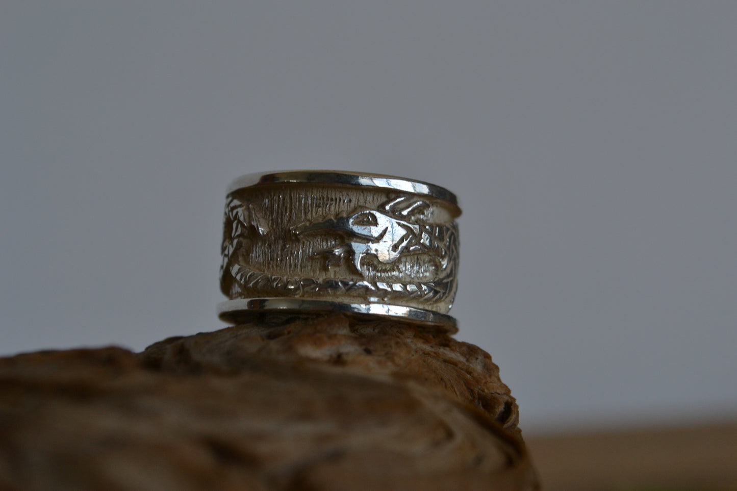 Silver ring with dragon. Band