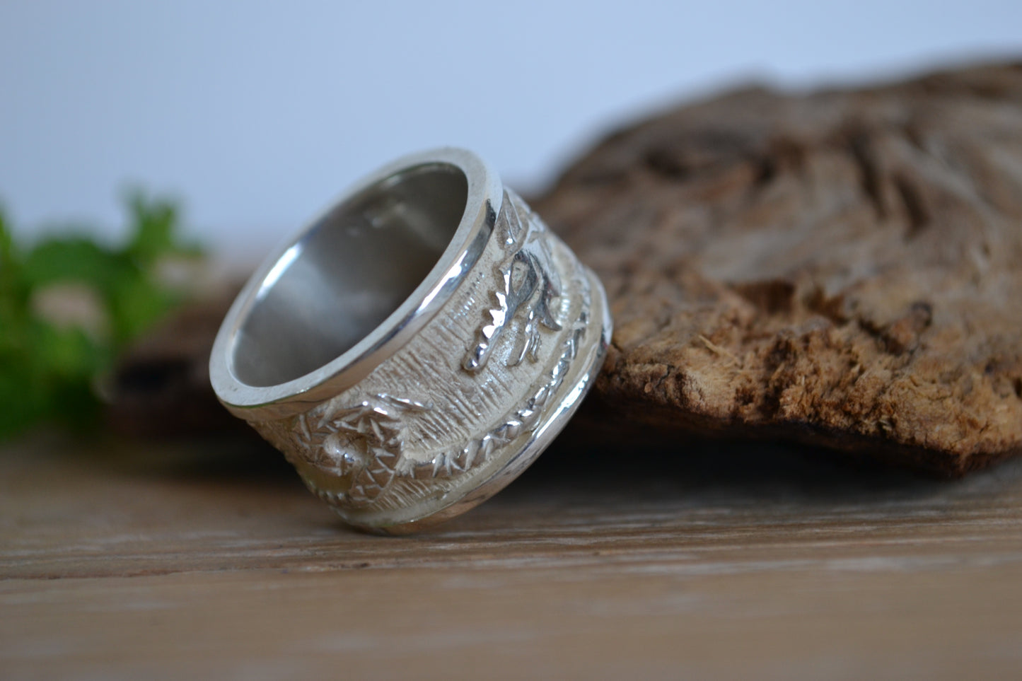 Silver ring with dragon. Band