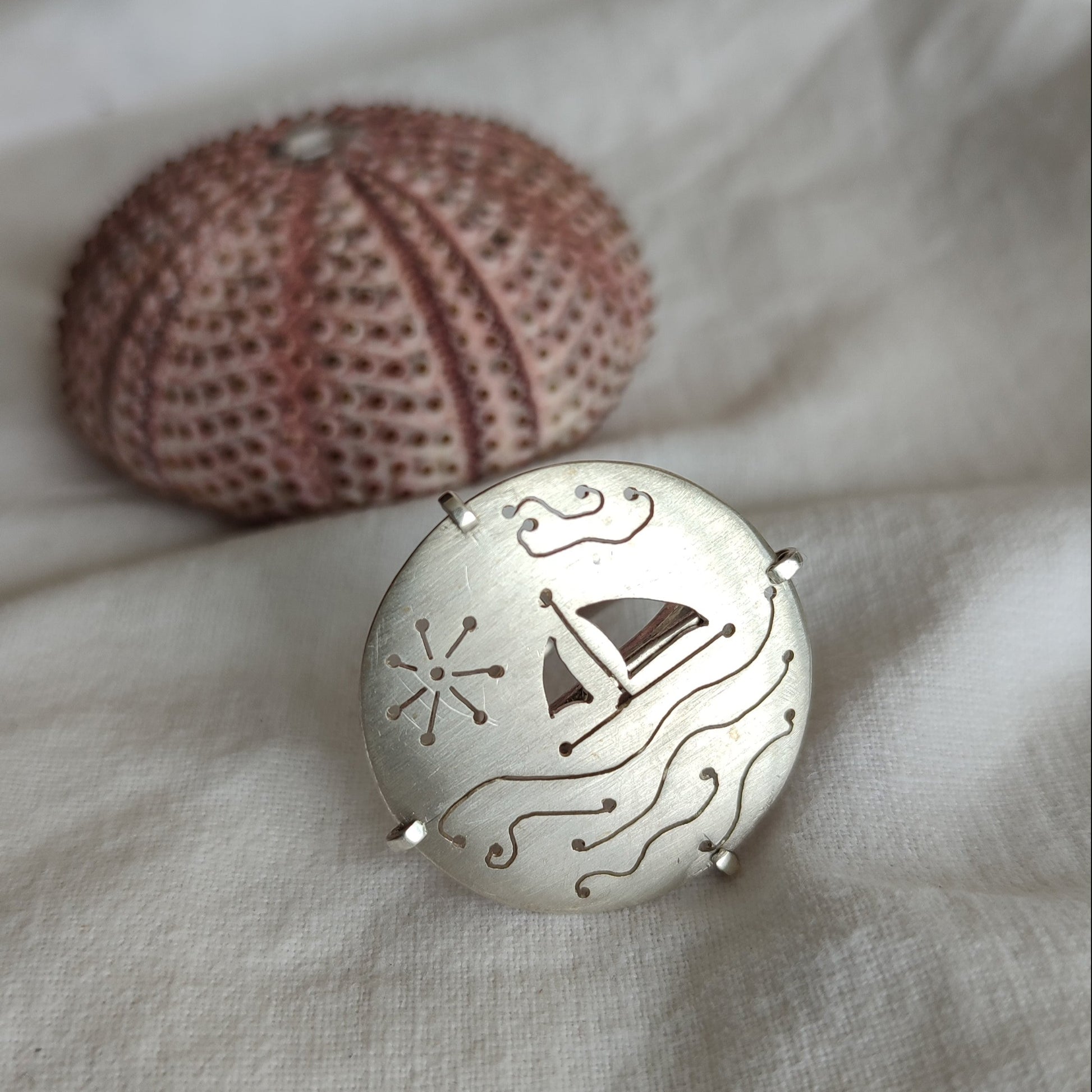 Silver ring with a sailing ship